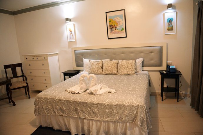Imagen de la habitación del Hotel Batey Boutique. Foto 15