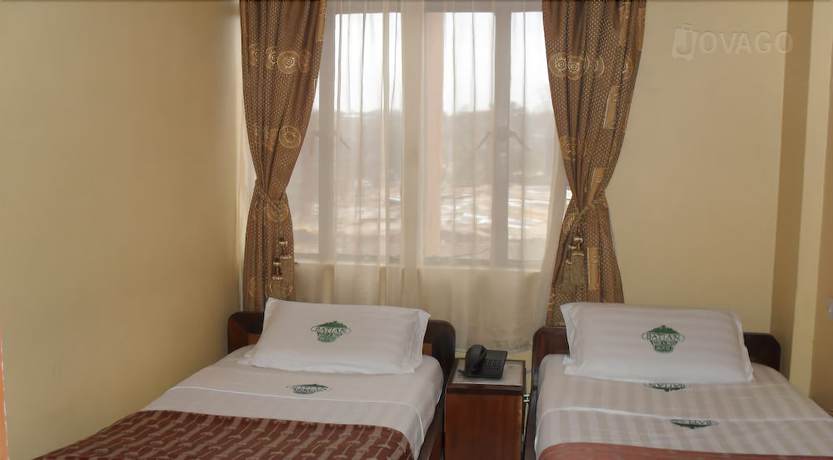 Imagen de la habitación del Hotel Batian Grand Hotel. Foto 12