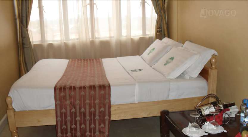 Imagen de la habitación del Hotel Batian Grand Hotel. Foto 15