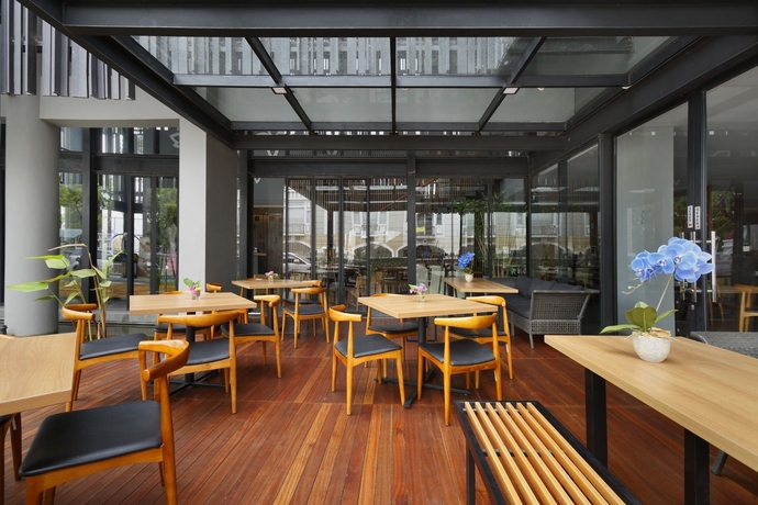 Imagen del bar/restaurante del Hotel Batiqa Jababeka Cikarang. Foto 5