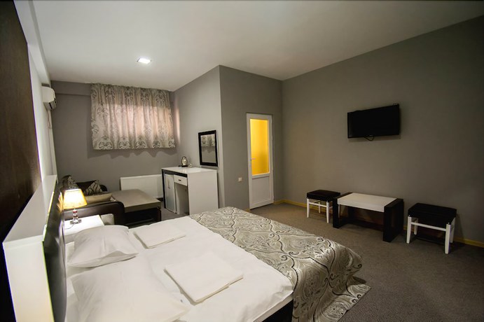 Imagen de la habitación del Hotel Batoni. Foto 15