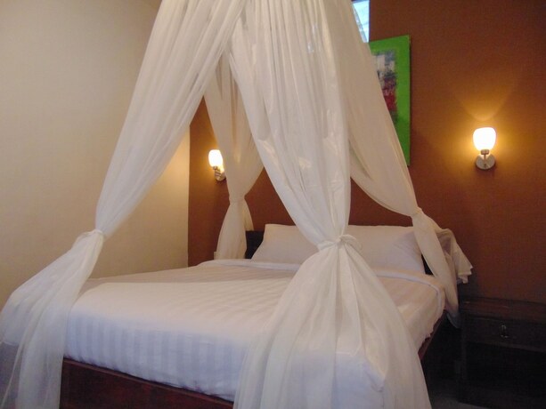 Imagen de la habitación del Hotel Batu Kandik Homestay. Foto 19
