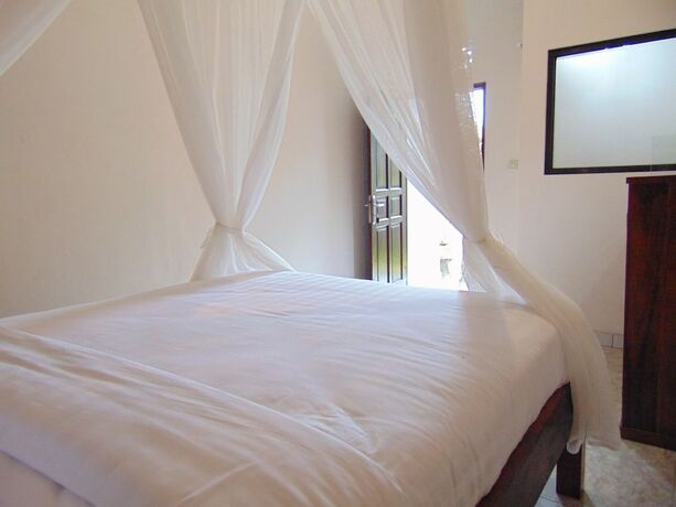 Imagen de la habitación del Hotel Batu Kandik Homestay. Foto 23
