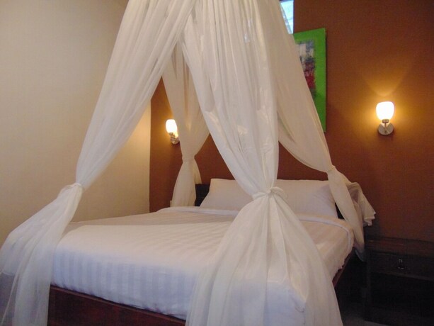 Imagen de la habitación del Hotel Batu Kandik Homestay. Foto 24