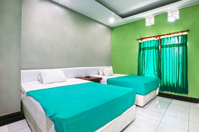 Imagen de la habitación del Hotel Batukaru Garden 3. Foto 18