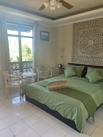 Imagen de la habitación del Hotel Batur Sunrise Guesthouse. Foto 16