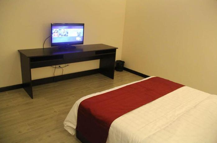 Imagen de la habitación del Hotel Bauan Plaza. Foto 5