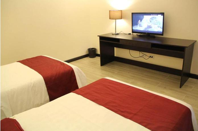 Imagen de la habitación del Hotel Bauan Plaza. Foto 7