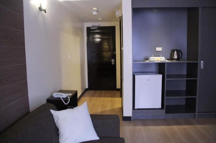 Imagen de la habitación del Hotel Bauan Plaza. Foto 10