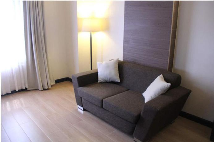 Imagen de la habitación del Hotel Bauan Plaza. Foto 13