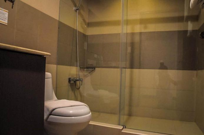 Imagen de la habitación del Hotel Bauan Plaza. Foto 14