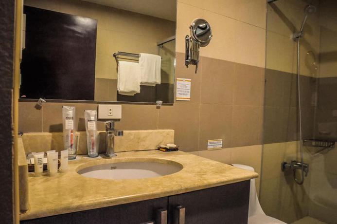 Imagen de la habitación del Hotel Bauan Plaza. Foto 15