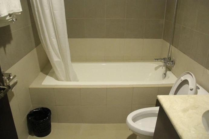 Imagen de la habitación del Hotel Bauan Plaza. Foto 17