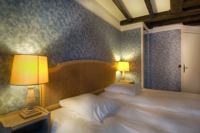 Imagen de la habitación del Hotel Baudelaire Opéra. Foto 5