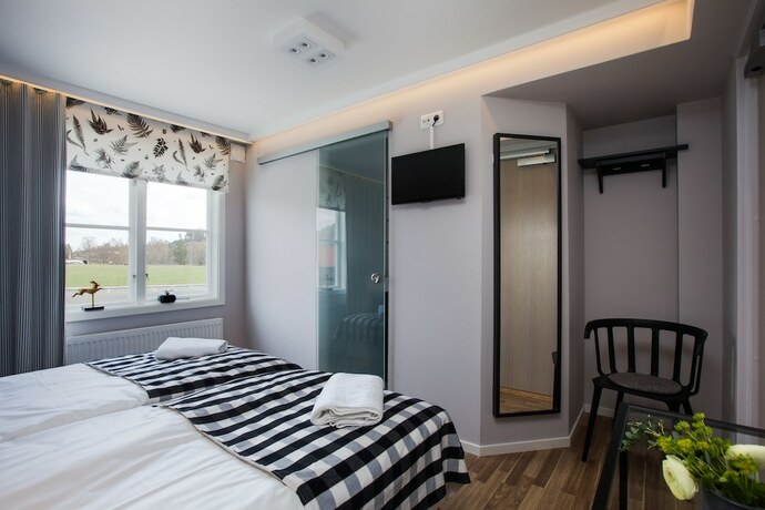 Imagen de la habitación del Hotel BauerGården Gästgiveri and Konferens. Foto 19