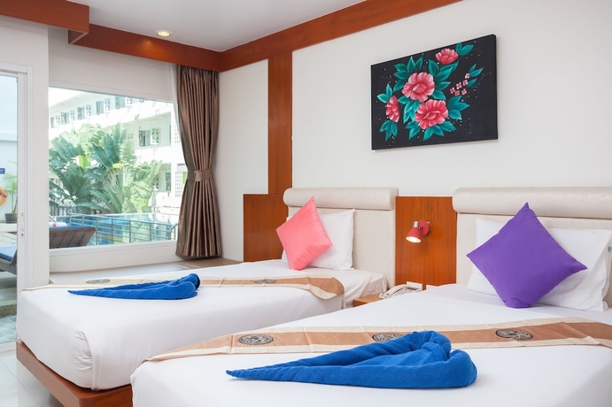 Imagen de la habitación del Hotel Baumancasa Beach Resort. Foto 2