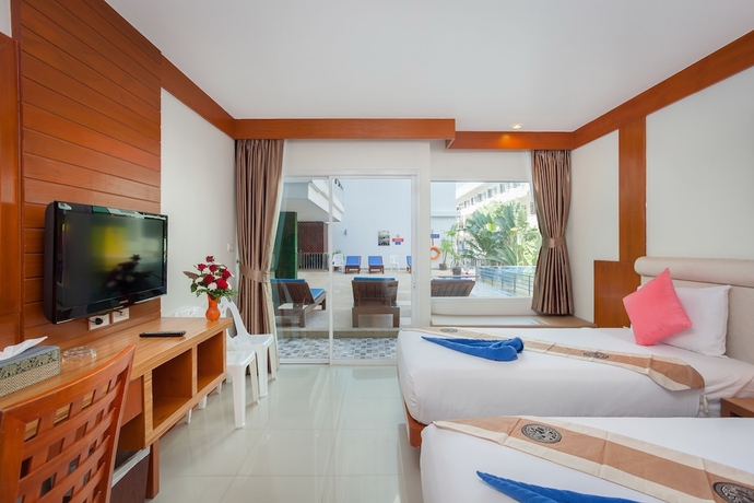 Imagen de la habitación del Hotel Baumancasa Beach Resort. Foto 3