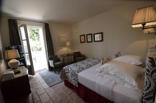 Imagen de la habitación del Hotel Baumanière Les Baux De Provence. Foto 12