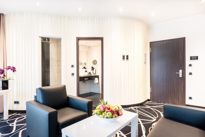 Imagen de la habitación del Hotel B&auml;der Park. Foto 11