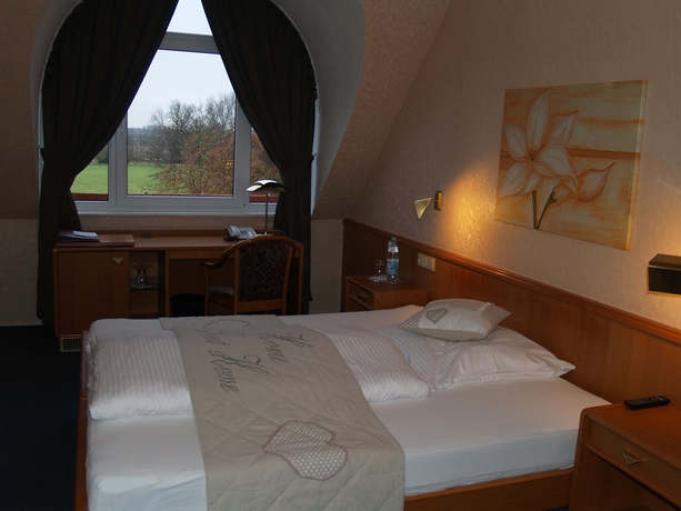 Imagen de la habitación del Hotel Bauschheimer Hof. Foto 5