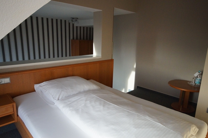 Imagen de la habitación del Hotel Bauschheimer Hof. Foto 13