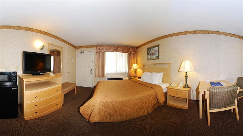 Imagen de la habitación del Hotel Bay Area Inn & Suites. Foto 9