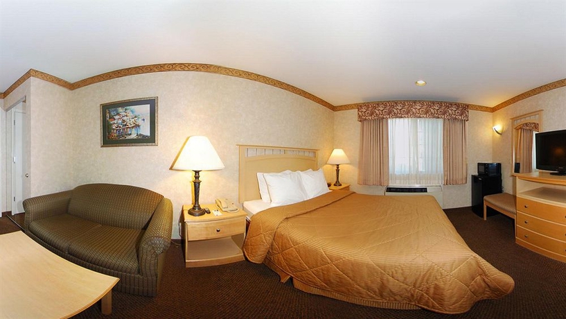Imagen de la habitación del Hotel Bay Area Inn & Suites. Foto 12