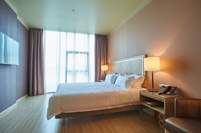 Imagen de la habitación del Hotel Bay Garden. Foto 2