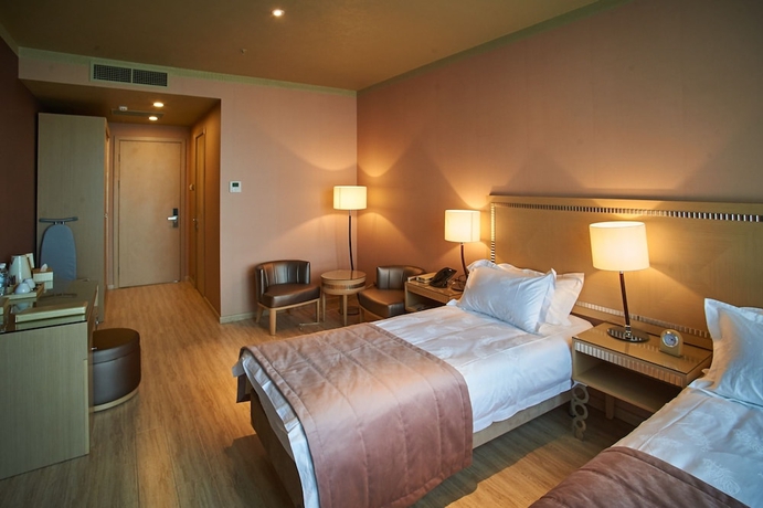 Imagen de la habitación del Hotel Bay Garden. Foto 9