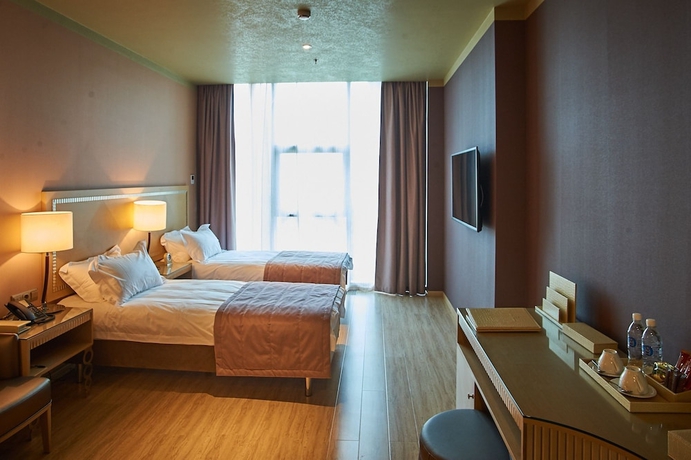 Imagen de la habitación del Hotel Bay Garden. Foto 12