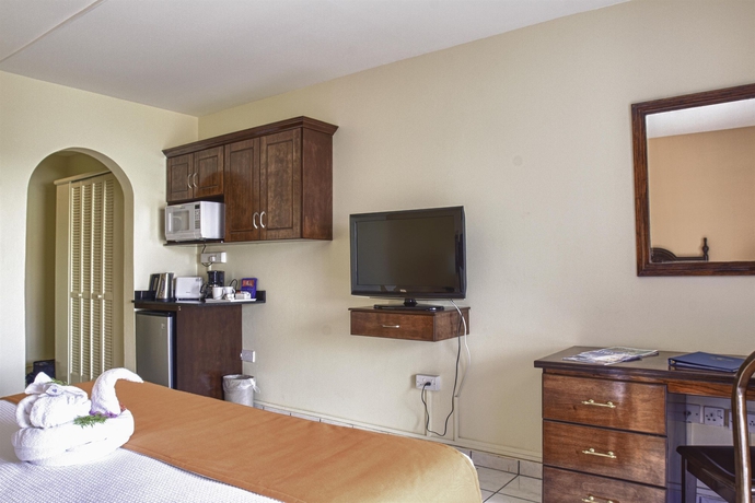 Imagen de la habitación del Hotel Bay Gardens Inn. Foto 7