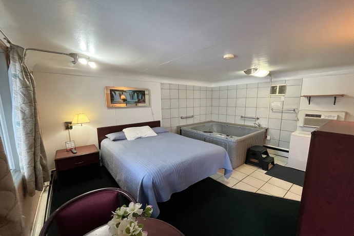 Imagen de la habitación del Hotel Bay Motel By OYO Bay City. Foto 11