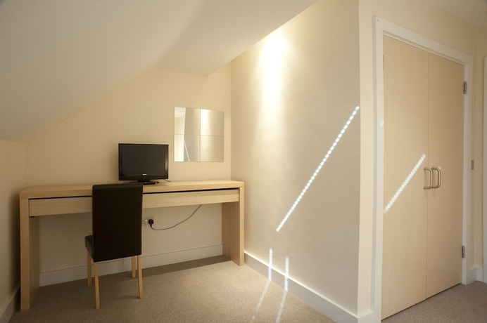 Imagen de la habitación del Hotel Bay Retreat Villas. Foto 8