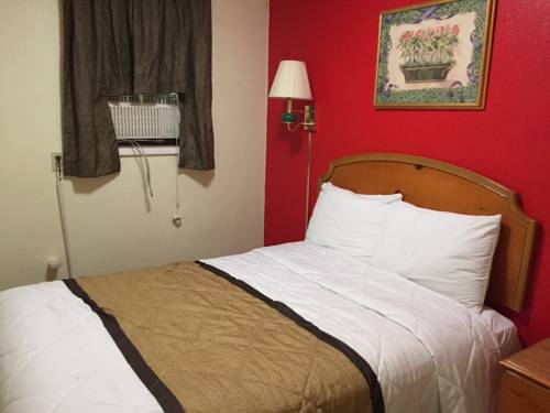 Imagen de la habitación del Hotel Bay Side Inn & Suites. Foto 6