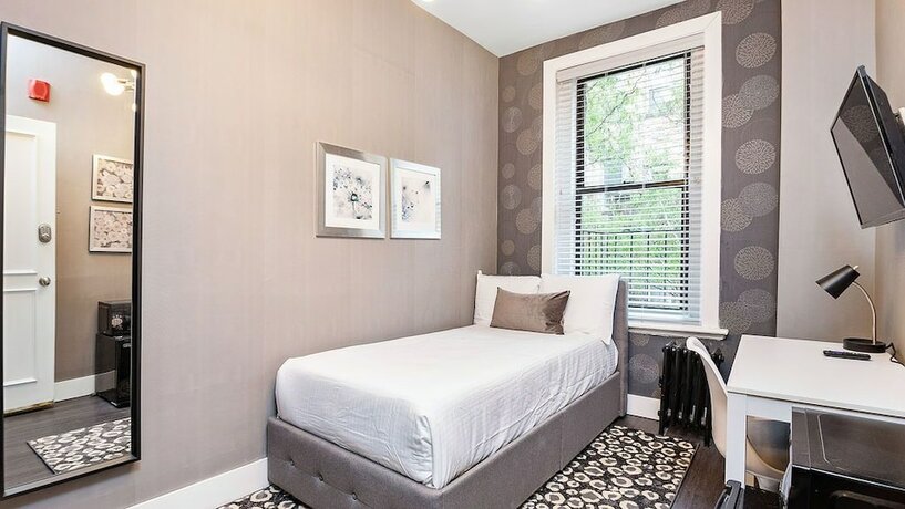 Imagen de la habitación del Hotel Bay Village Suites. Foto 2