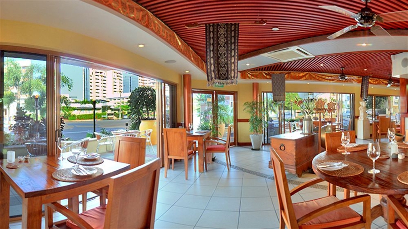 Imagen del bar/restaurante del Hotel Bay Village Tropical Retreat and Apartments. Foto 1