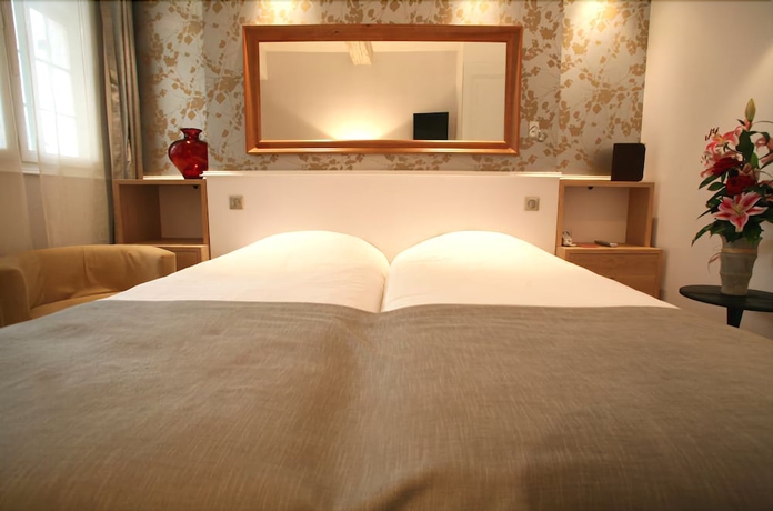 Imagen de la habitación del Hotel Bayard Bellecour. Foto 11