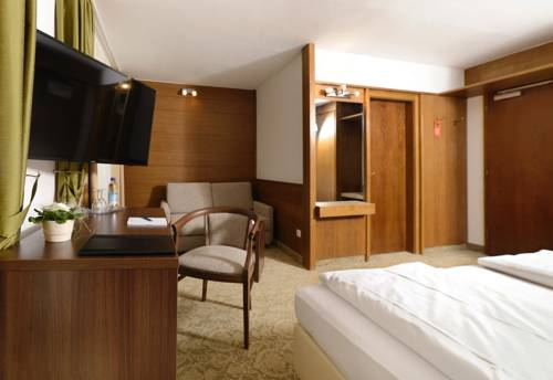 Imagen de la habitación del Hotel Bayerisch Meran. Foto 13