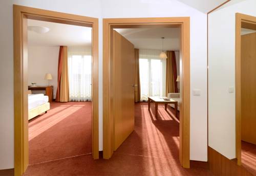 Imagen de la habitación del Hotel Bayerisch Meran. Foto 15