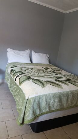 Imagen de la habitación del Hotel Bayfront Cottages. Foto 20