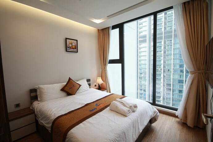 Imagen de la habitación del Hotel Bayhomes Metropolis Serviced Apartment. Foto 10