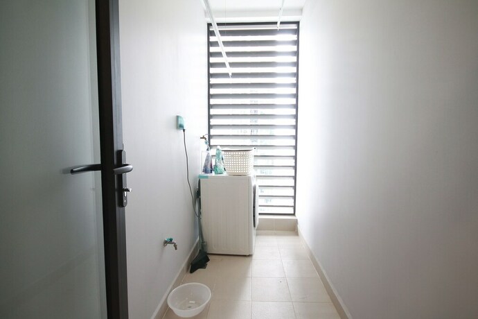 Imagen de la habitación del Hotel Bayhomes Metropolis Serviced Apartment. Foto 15