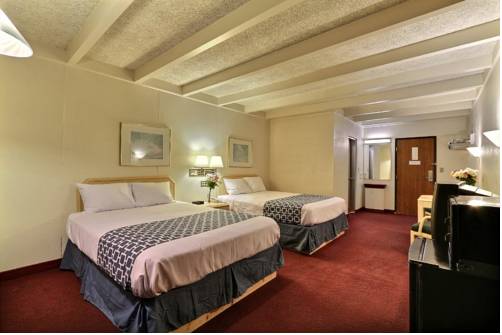 Imagen de la habitación del Hotel Baymont By Wyndham Bay City. Foto 1