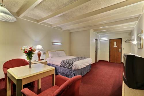 Imagen de la habitación del Hotel Baymont By Wyndham Bay City. Foto 7