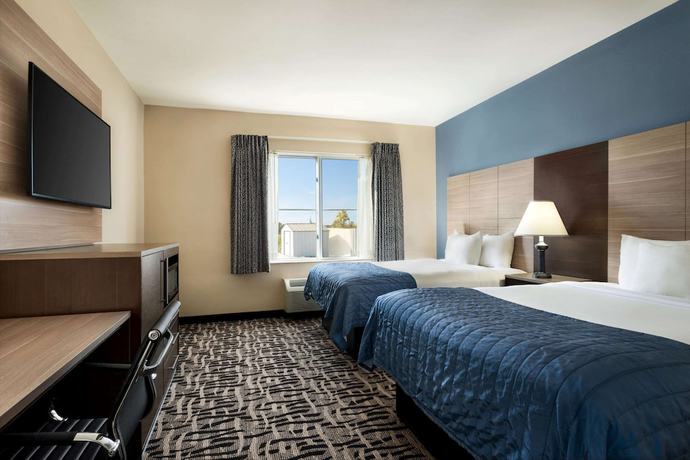Imagen de la habitación del Hotel Baymont By Wyndham Ft. Leonard/saint Robert. Foto 8