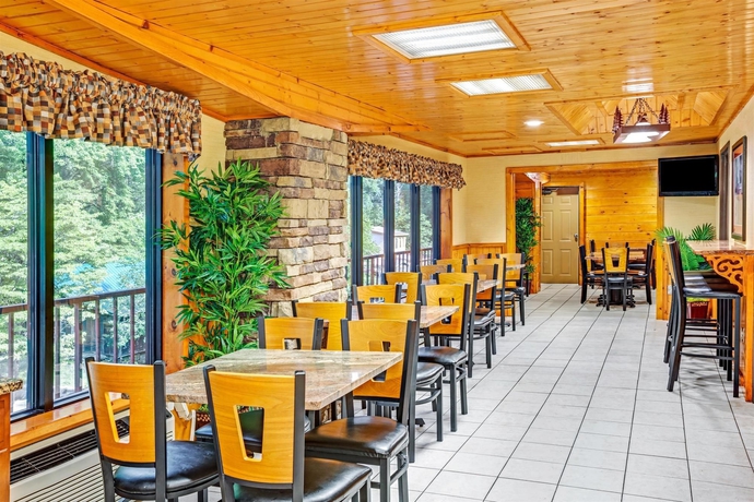 Imagen del bar/restaurante del Hotel Baymont By Wyndham Gatlinburg On The River. Foto 3