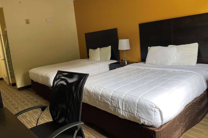 Imagen de la habitación del Hotel Baymont By Wyndham Houston North. Foto 8