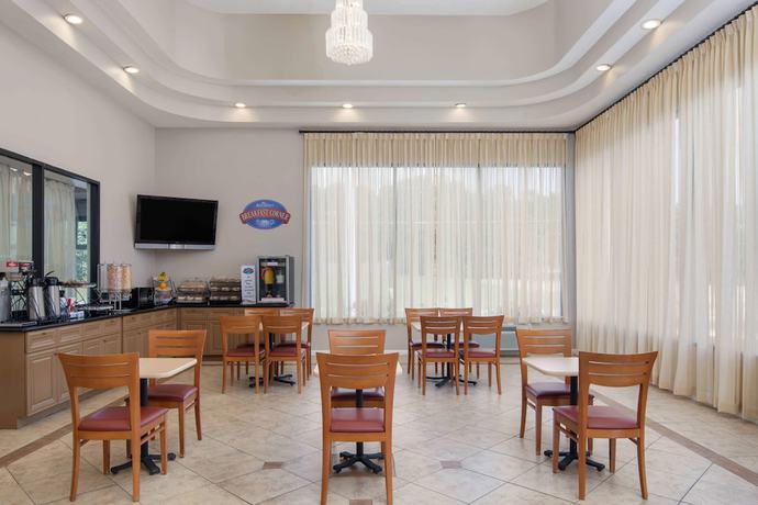 Imagen del bar/restaurante del Hotel Baymont Inn And Suites Douglasville Atlanta. Foto 3