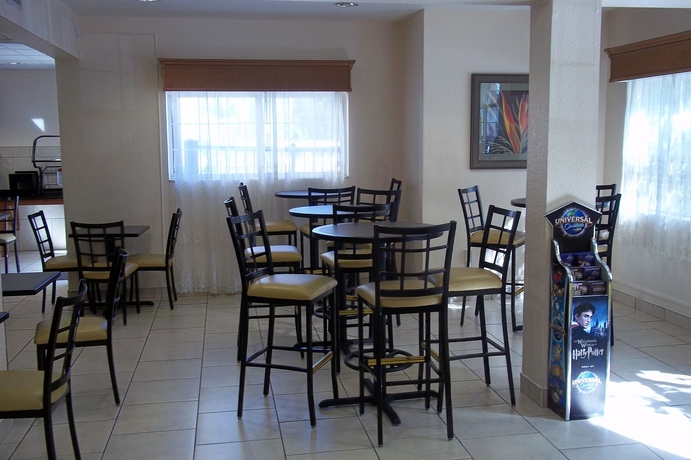 Imagen del bar/restaurante del Hotel Baymont by Wyndham Orlando/International Dr/Universal Blvd. Foto 6