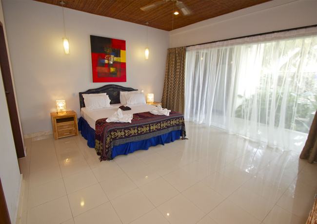 Imagen de la habitación del Hotel Bayshore Villas Candi Dasa. Foto 3